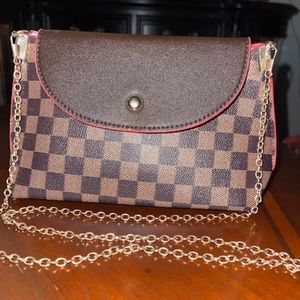 Louis Vuitton Damien clutch/crossbody bag